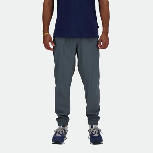 Pantalón New Balance Essentials Woven Hombre - DARK GREY